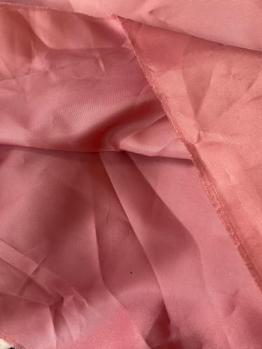 Customer's close-up of the silky mauve Premium Taffeta Lining fabric.
