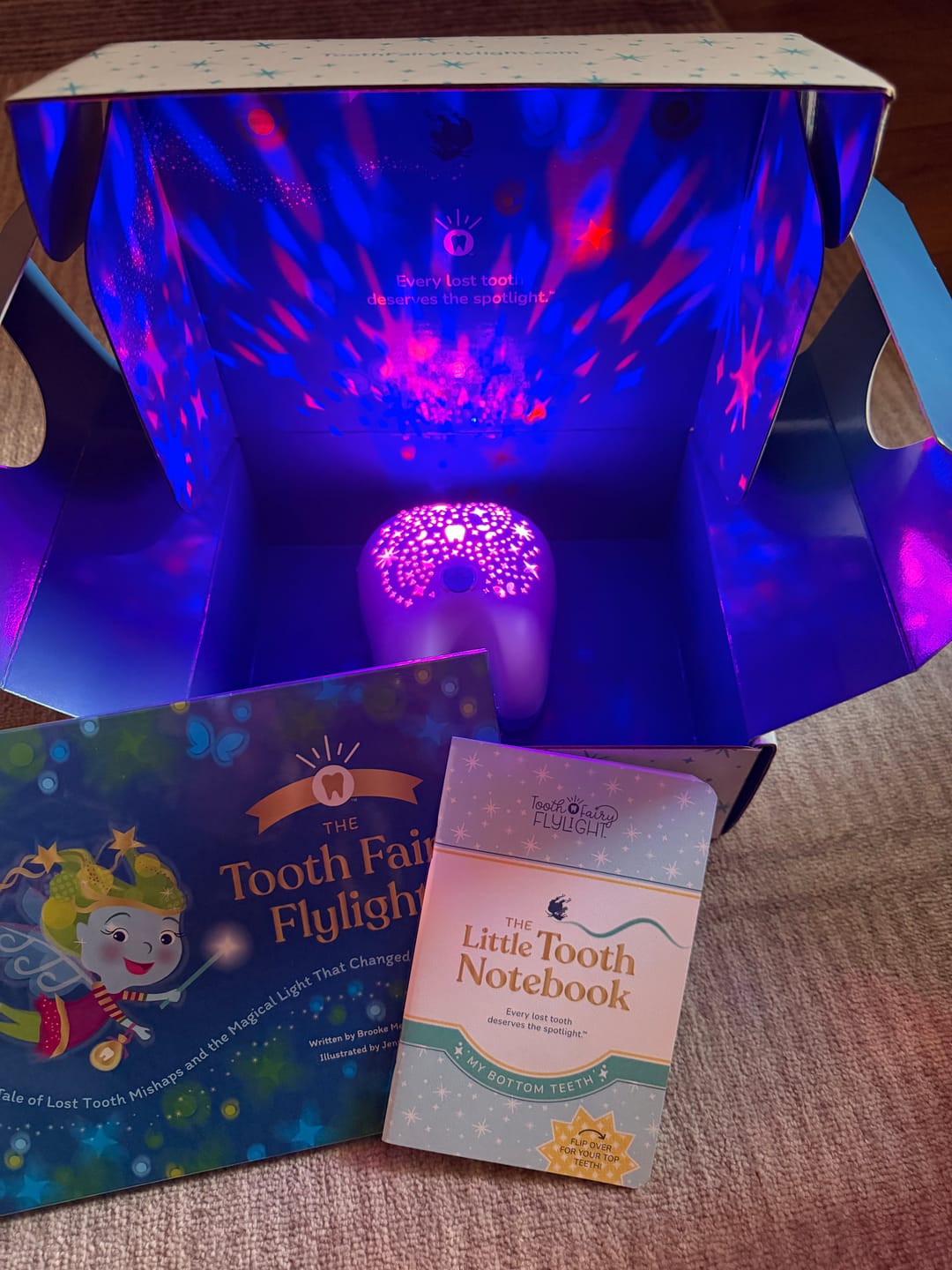 Customer photo review of Flylight - Tooth Fairy Colorful Projector Night Light
