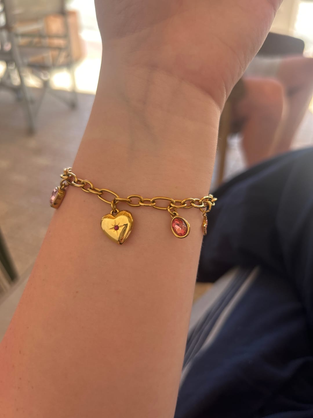 Customer photo review of Daisy Pink Gold Charm Bracelet