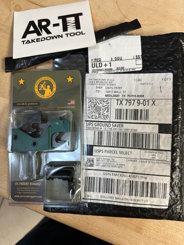 Customer's OD Green Disruptor FRT in its packaging next to the shipping mailer, supporting a review about an incomplete order.