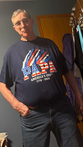 Customer wearing the blue personalized 'PAPA' shirt with a patriotic 250th anniversary graphic.