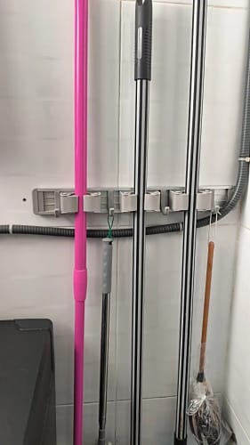 Customer photo review of Wall Mounted Mop & Broom Holder Rack 5 Hooks