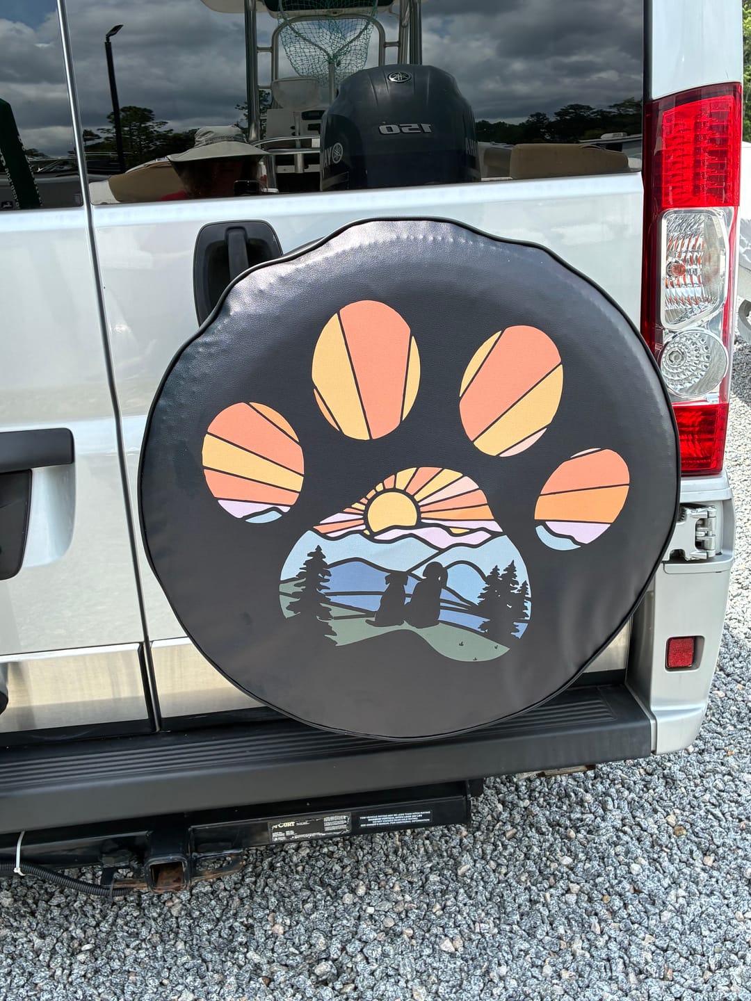 Customer photo review of Dog Paw with Girl Sunset Spare Tire Cover for Jeep, Bronco, RV, Camper, Trailer, & More