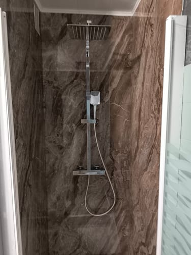 Customer photo review of Plaque Mural PVC Imitation Marbre – Onyx Cuivré Royal 260 x 120 CM