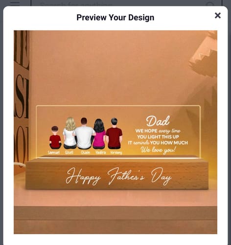 Reviewer's personalized acrylic LED night light showing an illuminated family design and a heartfelt message for a dad.