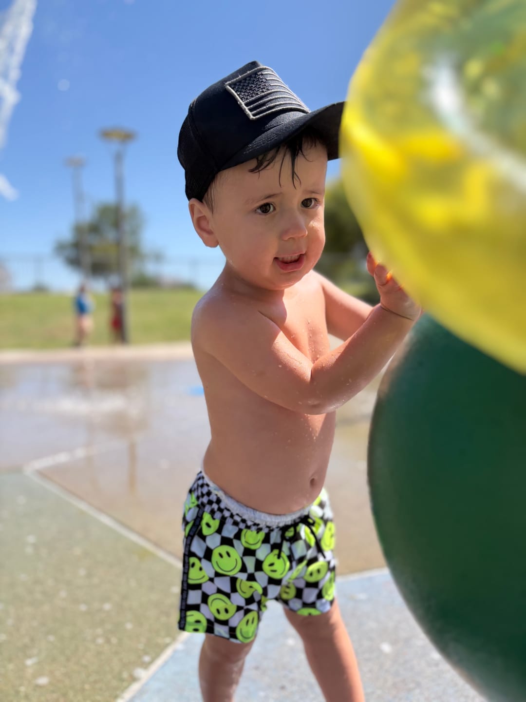 Customer photo review of Hybrid Swim Trunks in Neon Electric Lime Smileys