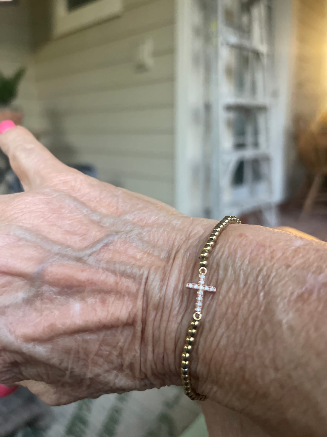 Customer photo review of Dainty Cross Bracelet