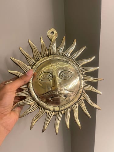 Customer photo review of Brass Surya (Sun) Ji Wall Hanging Idol Vastu Remedy for East Direction Balance, Fame and Positive Energy | 24 X 24 cm | 1 kg