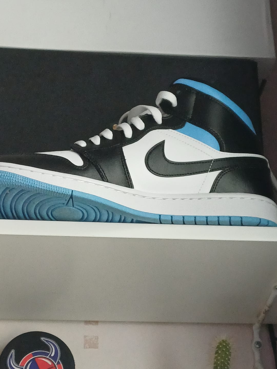 Customer photo review of Air Jordan 1 Mid University Blue