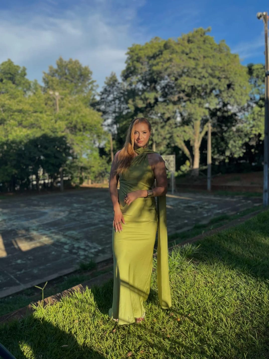 Customer photo review of Yanna Halter Backless Satin Dress