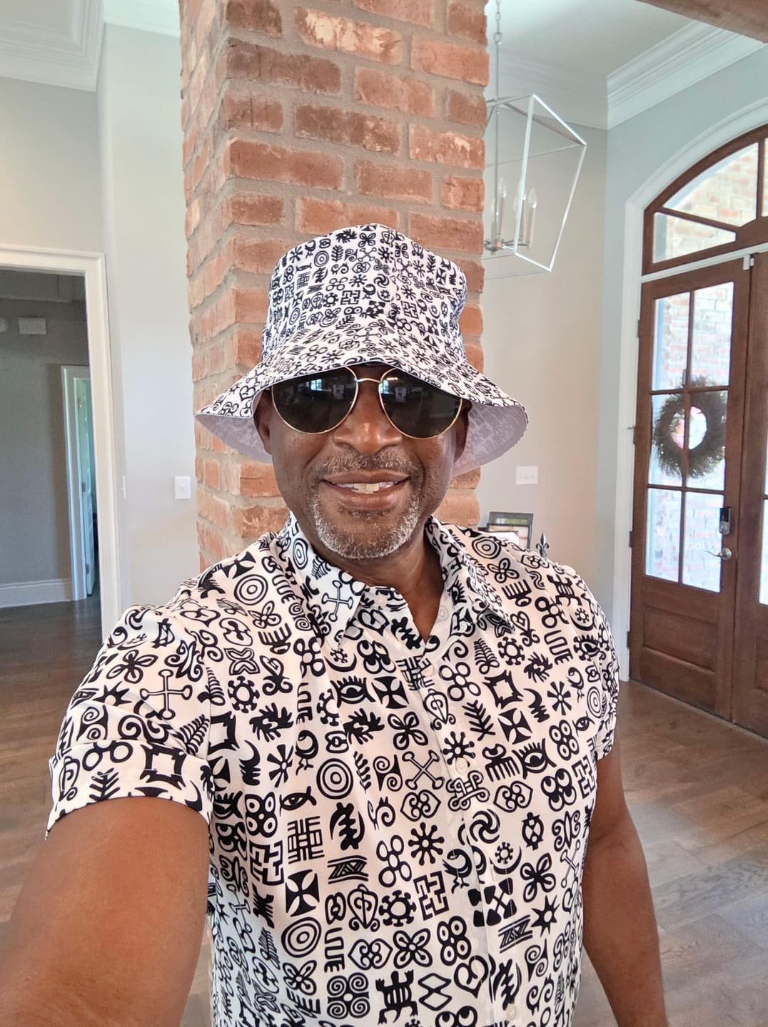 Customer photo review of Black And White Adinkra Tribe Symbols Bucket Hat