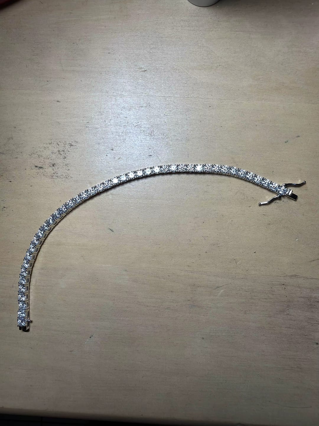 Customer photo review of 3MM VVS1 Moissanite Tennis Chain 16K Gold Plated