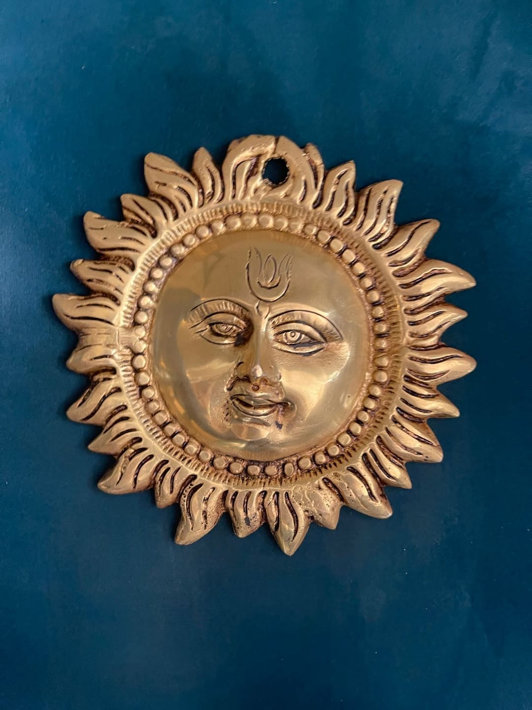 Customer photo review of Brass Vastu Sun Wall Hanging Idol Vastu Remedy for East Direction Balance, Fame and Positive Energy for Home, Office and Entrance Decor | 15 x 15 cm | 800 g