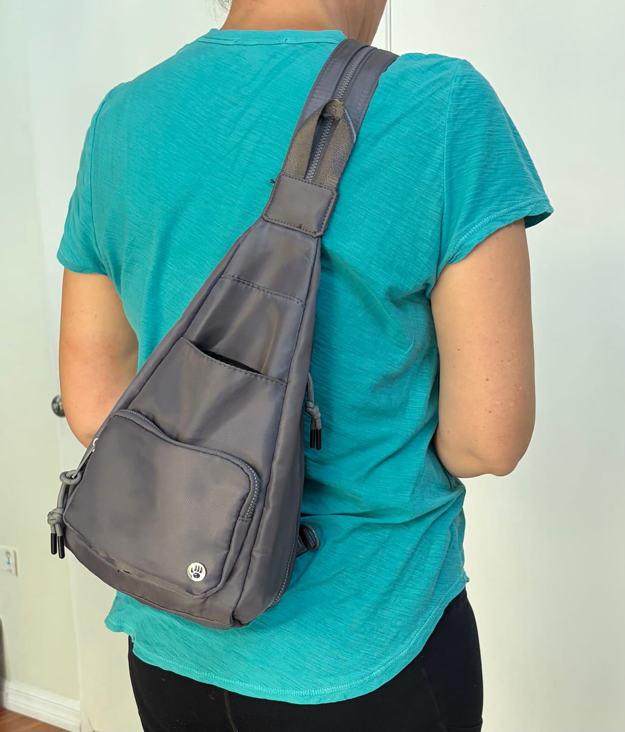 Customer photo review of SPORTY CONVERTIBLE BACKPACK/SLING DARK GRAY