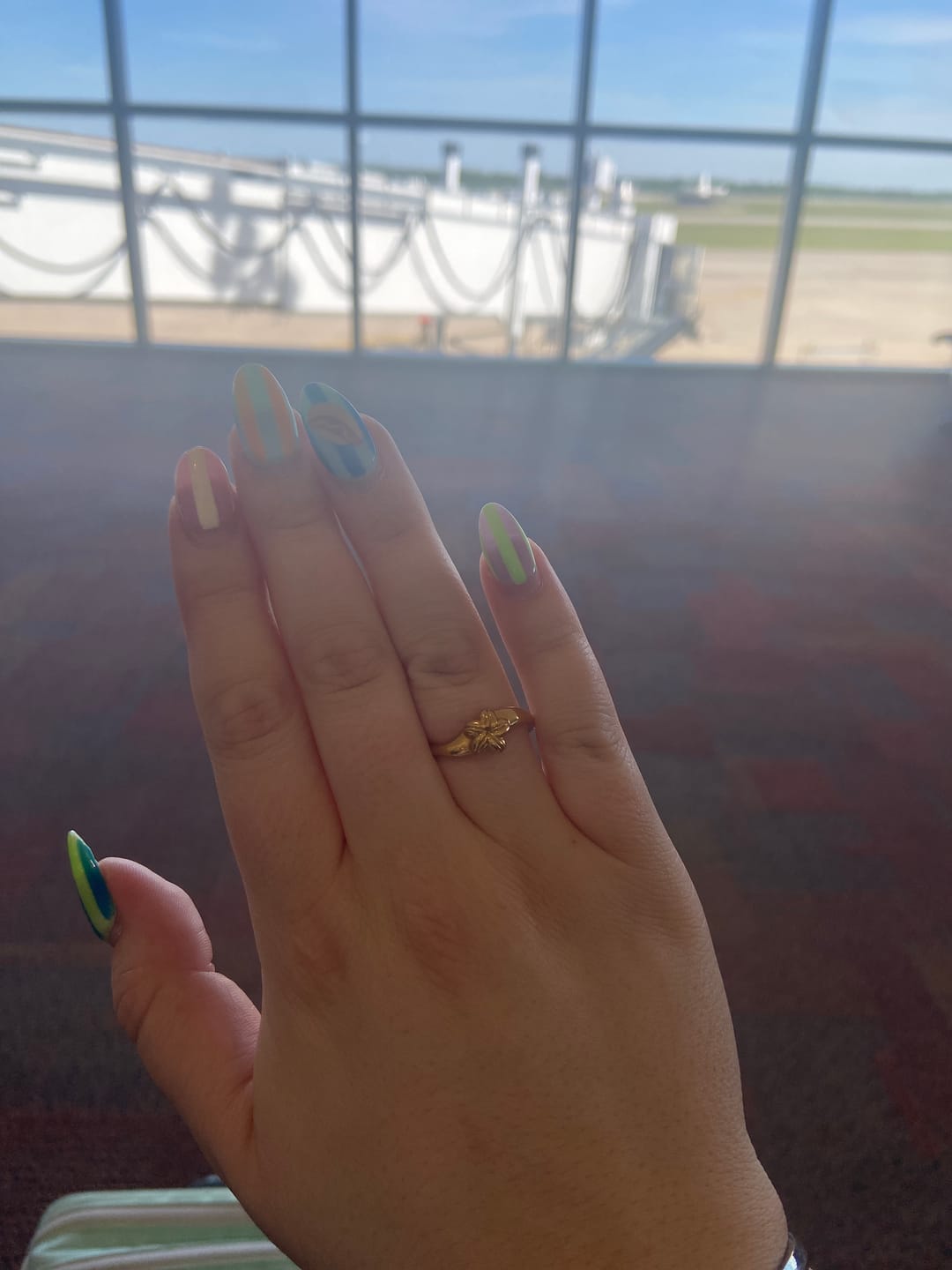 Customer photo review of Cowrie Plumeria Ring