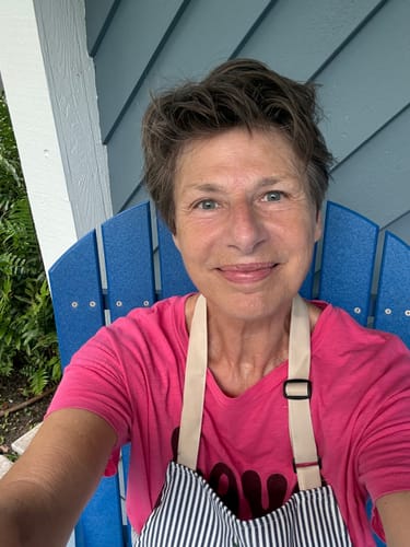 Reviewer smiling, showing refreshed skin results after using The Micro Infusion System.