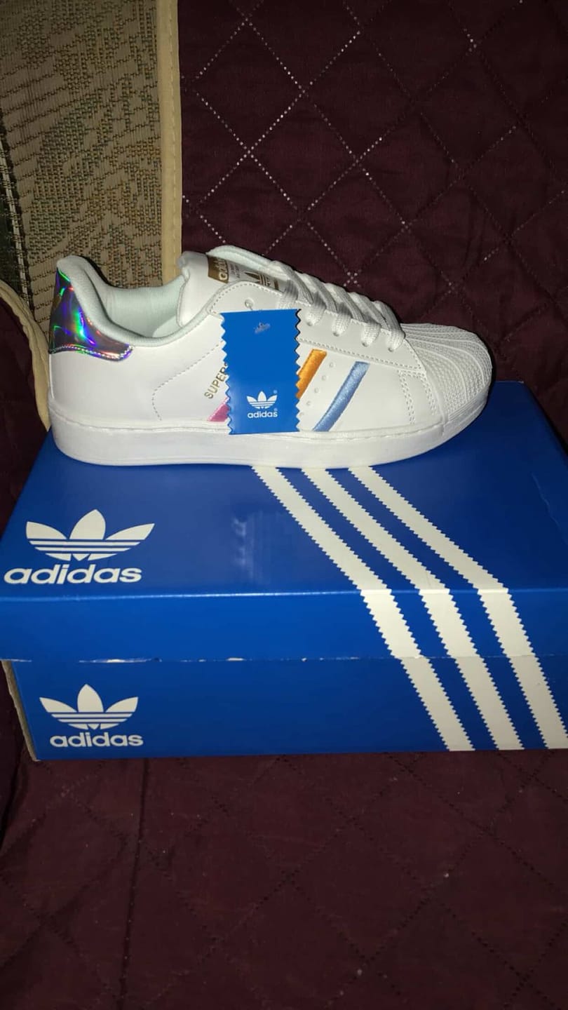 Customer photo review of Tenis Concha Blanco Glass