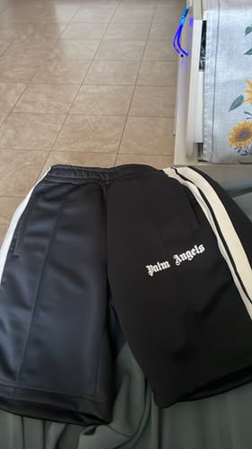 Recensione con foto di un cliente su Pantaloncino Palm Angels