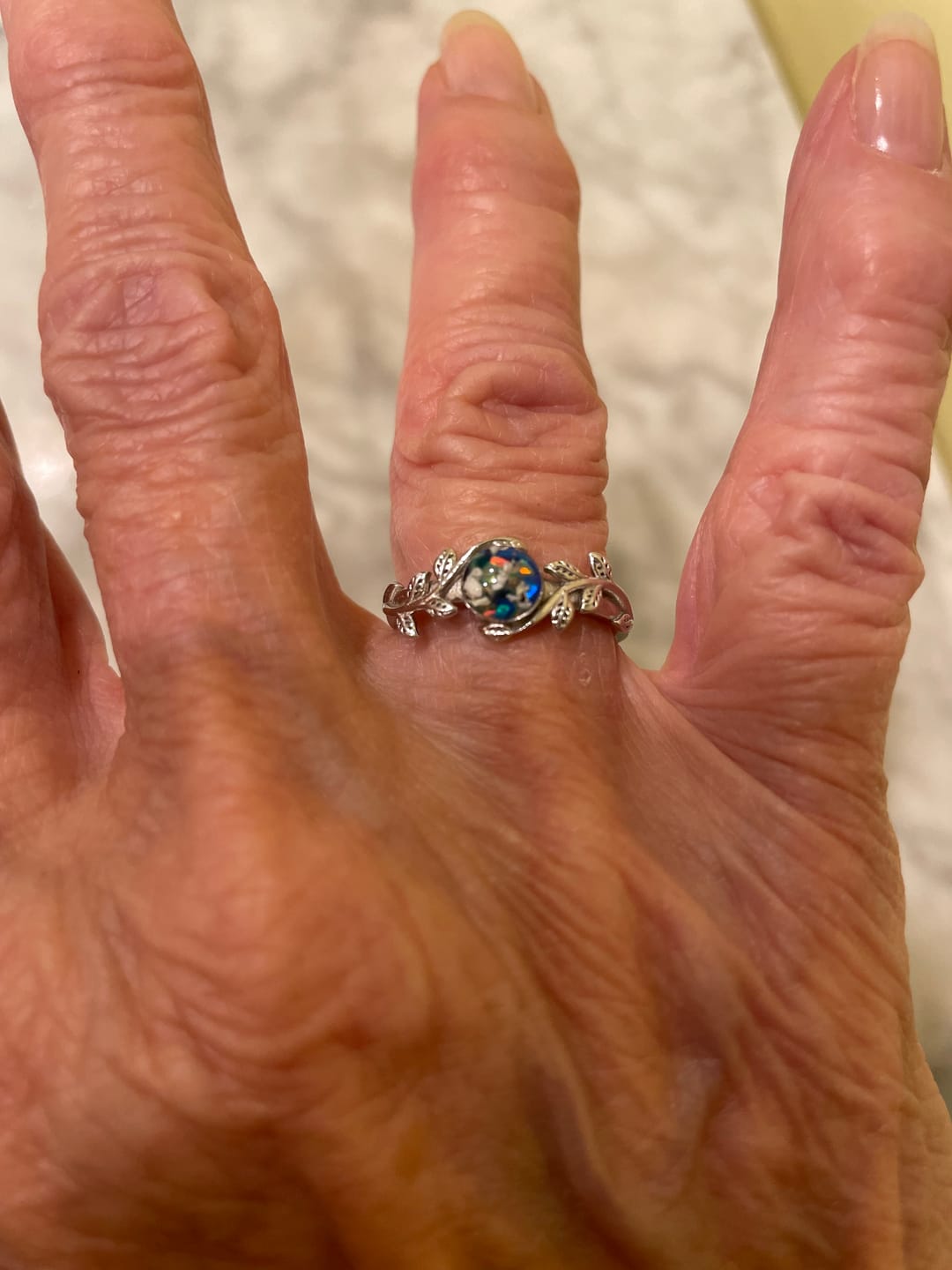 Customer photo review of Leaf Opal Cremation Ring