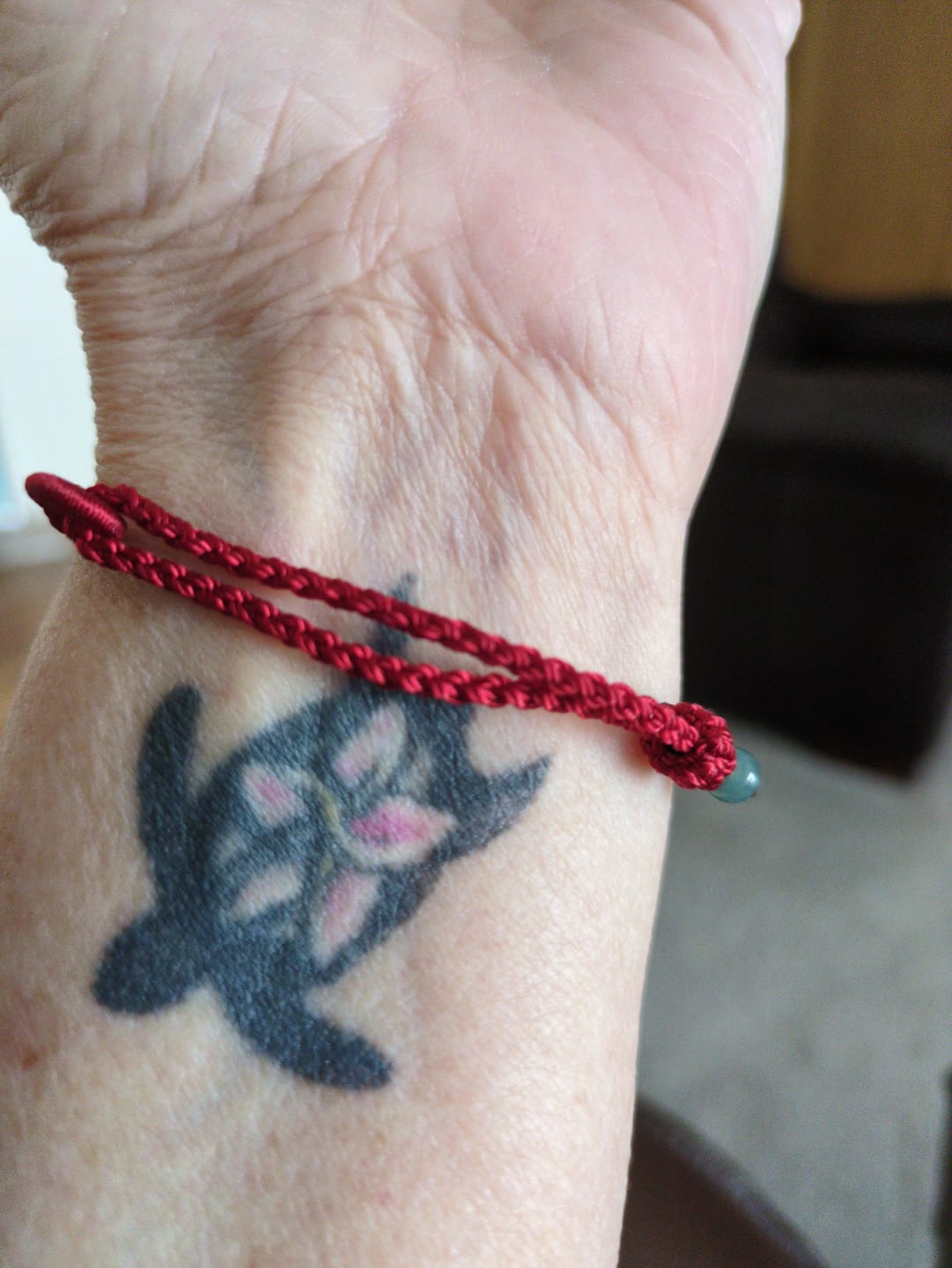 Customer photo review of Buddha Stones Red String Jade Connection Bracelet