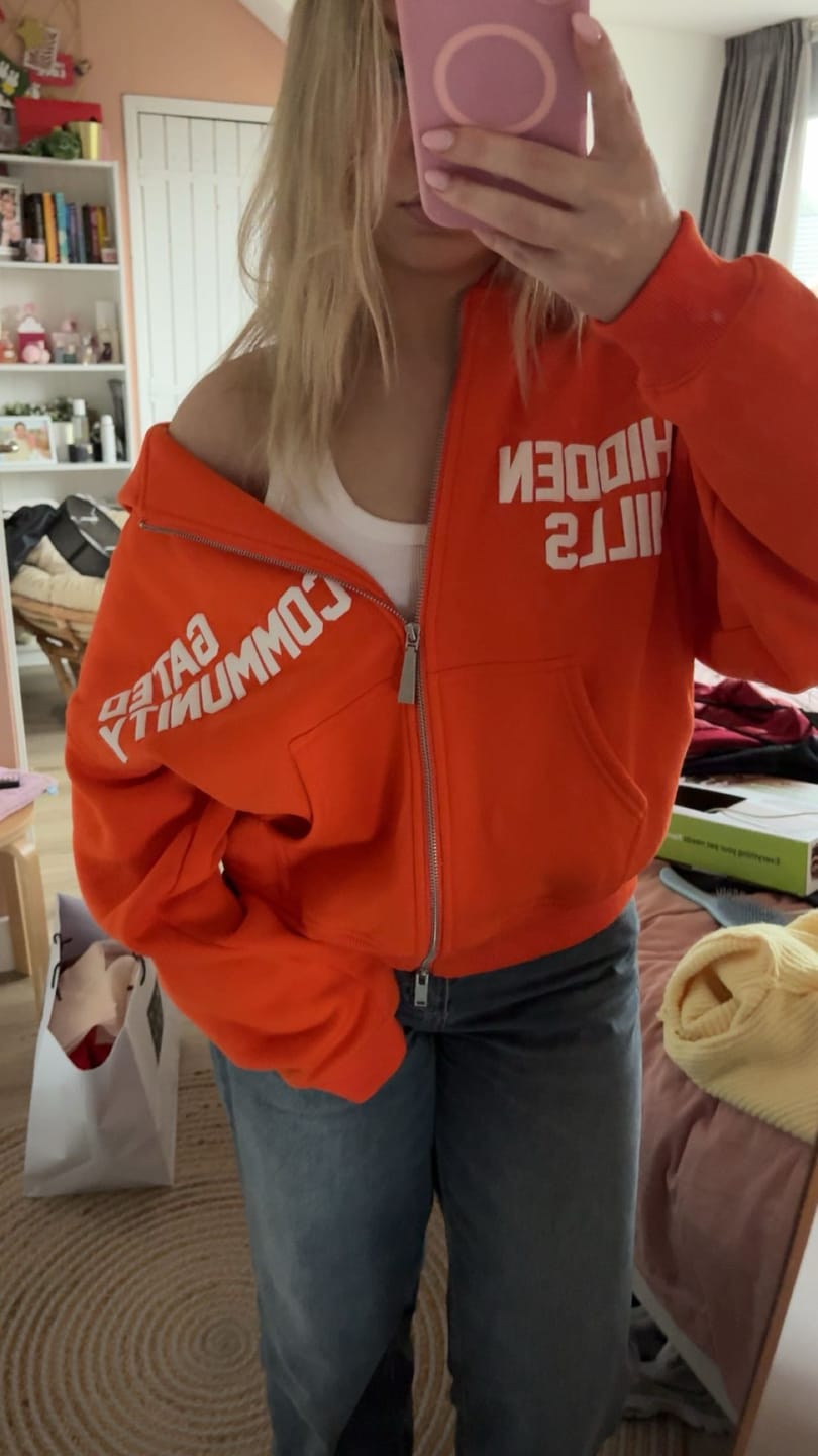 Customer photo review of GATED COMMUNITY ZIP HOODIE ORANGE