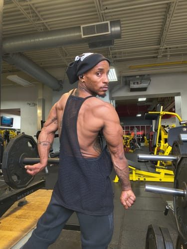 Customer photo review of Mens Sheer Mesh Hollow-Out Casual Tank SKUL19806