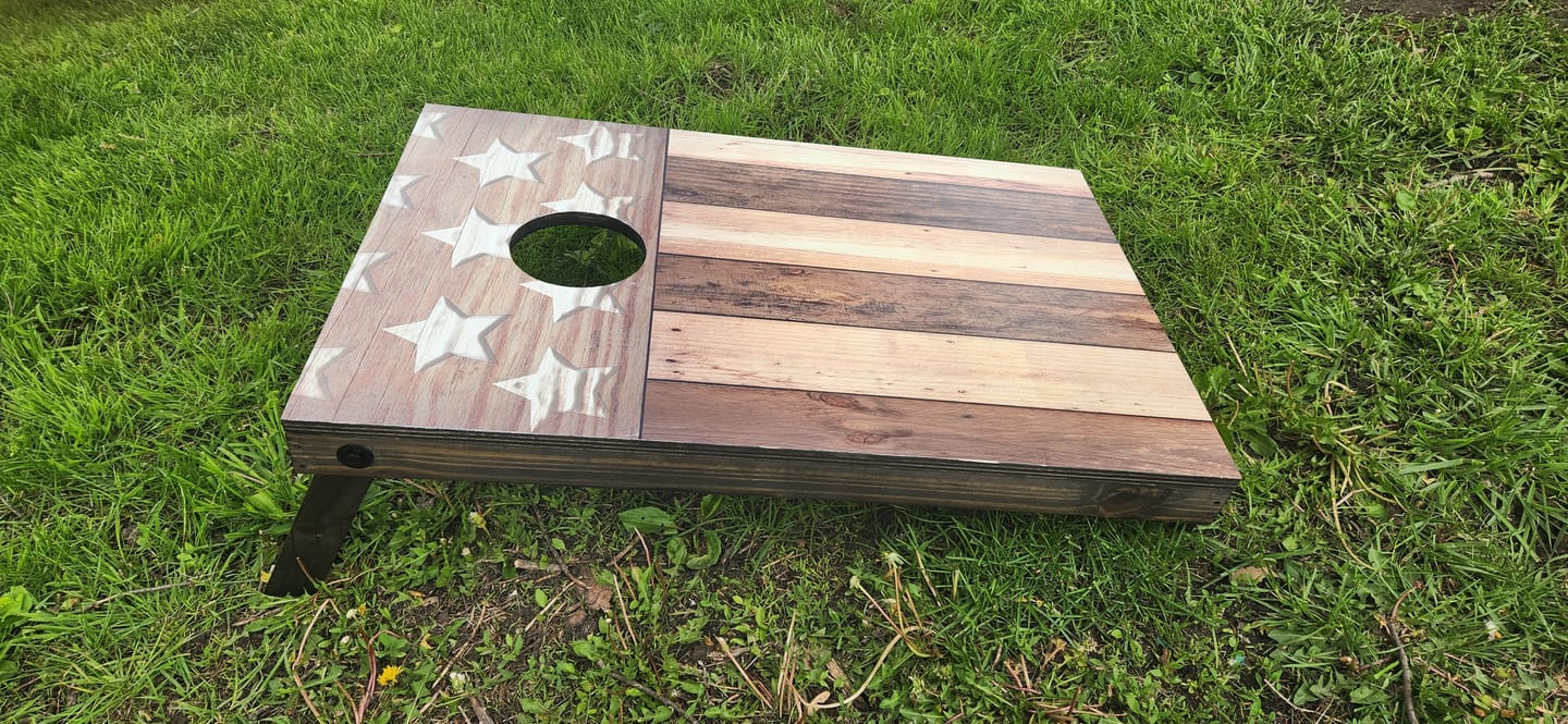 Customer photo review of Brown Distressed American Flag - Cornhole Board Wrap - Set of 2