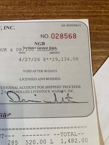 Close-up of a business document provided by the reviewer; the product is not shown.