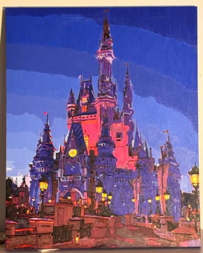 Customer's finished Custom Paint By Numbers painting of a vibrant, illuminated castle at night.