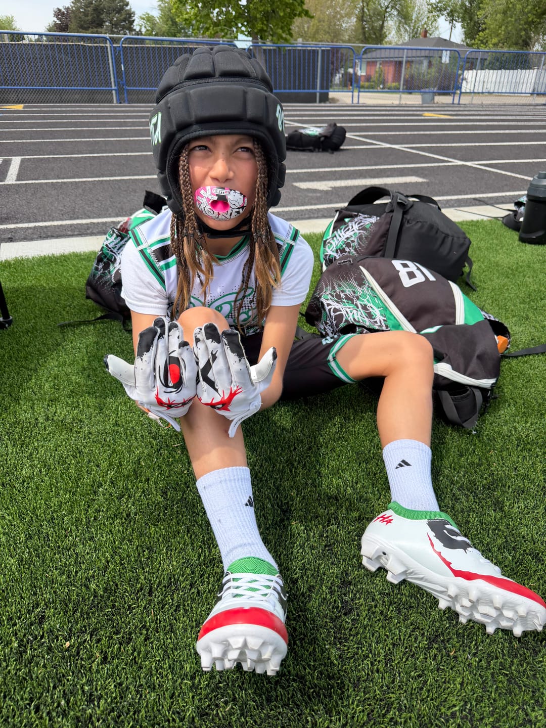 Customer photo review of The Officially Licensed Joker Youth Football Cleats - Velocity 2.0 by Phenom Elite