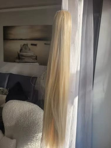 Customer photo review of Remy Ponytail Extension – Glatt