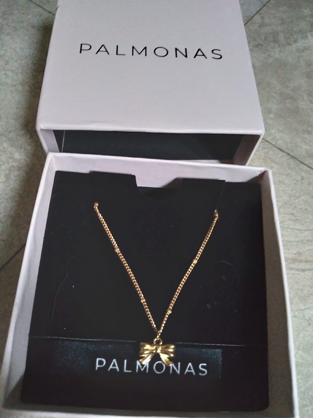 Customer photo review of Bow Pendant Necklace