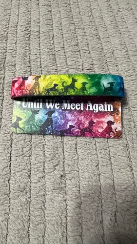 Customer's colorful Until We Meet Again Dog Bracelet on its backing card showing the phrase 'Until We Meet Again'.