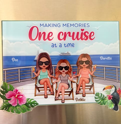 Customer's personalized cruise cabin door magnet with a colorful illustration of three women on a ship deck.