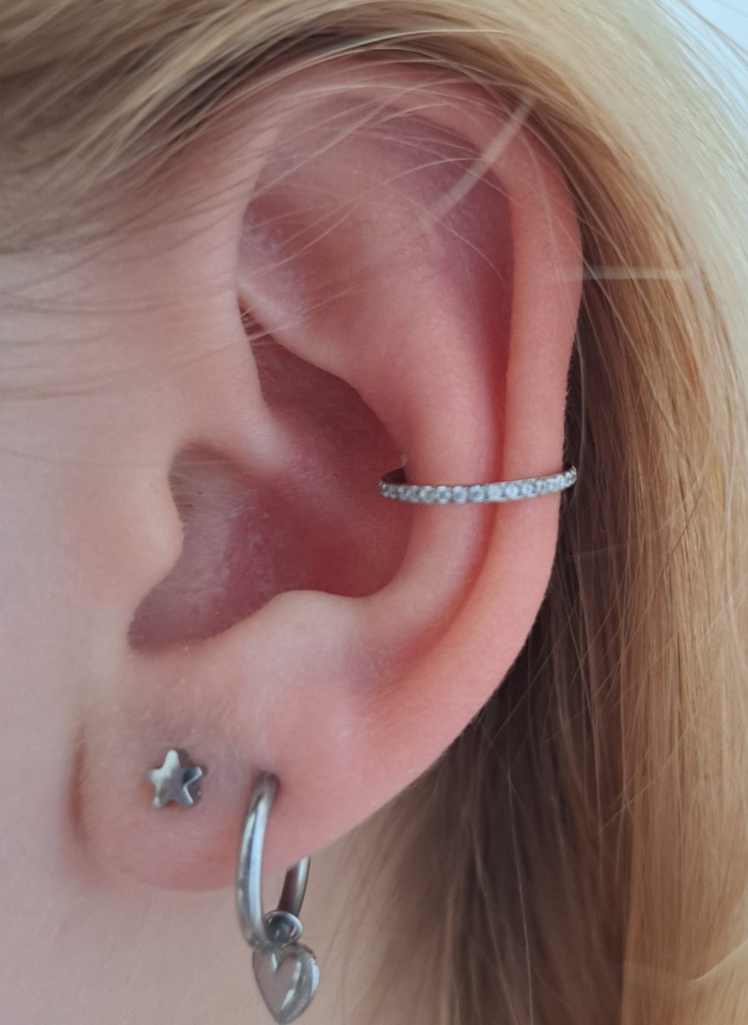 Customer photo review of Conch Clicker | Titan Piercing