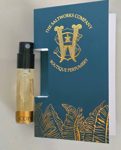 Customer's Copacabana perfume sample vial in its elegant teal and gold card.