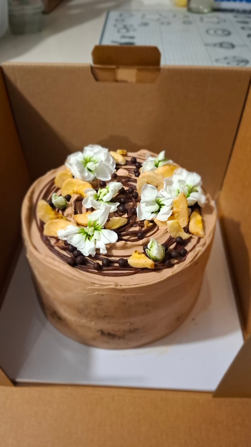 Customer photo review of banana chocolate cake