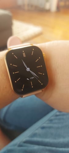 Customer's Gard Pro Health Smartwatch 3 with a gold case and pink band, displaying a classic analog face.