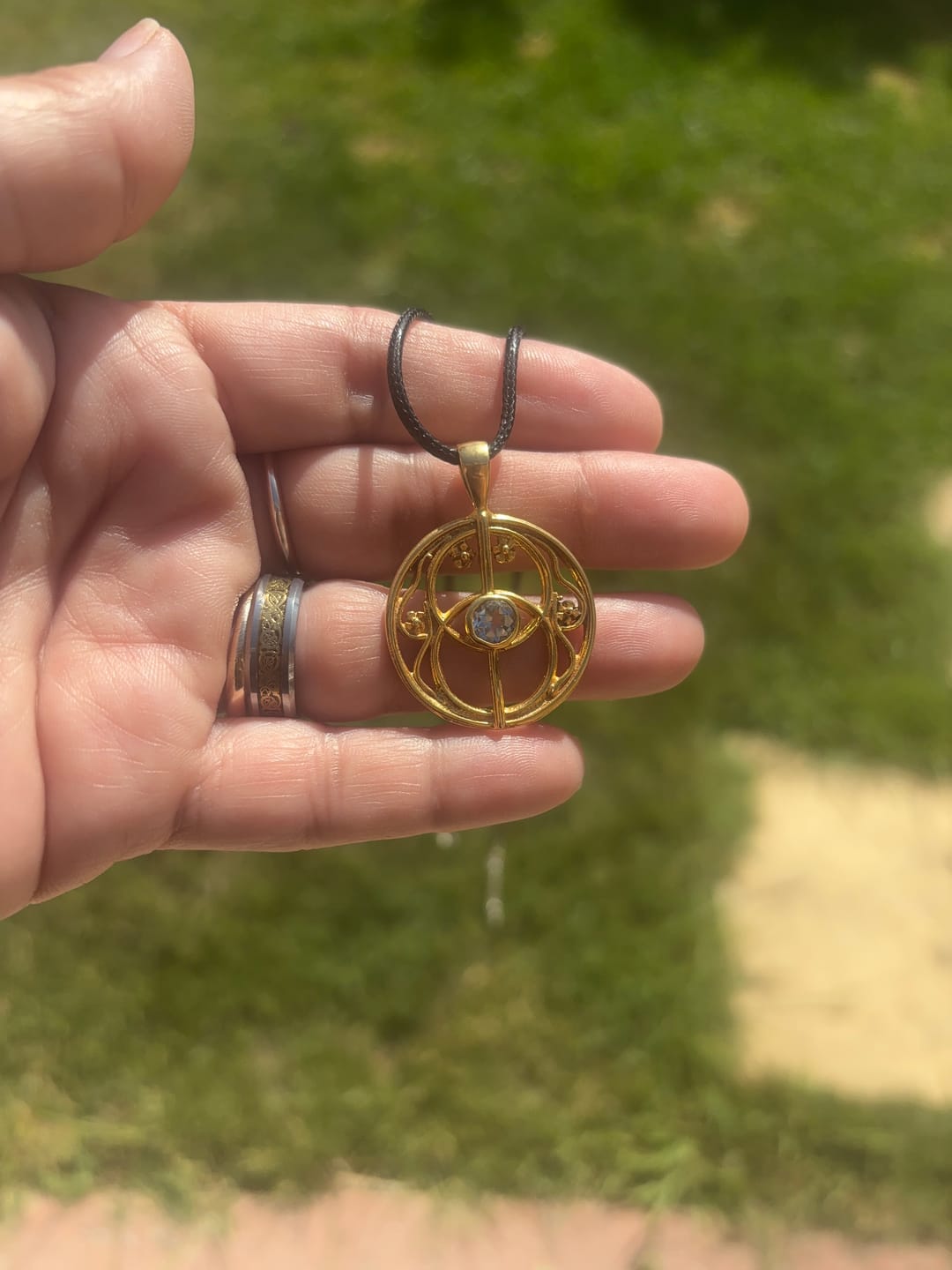 Customer photo review of Gilded Green Amethyst Chalice Well Pendant