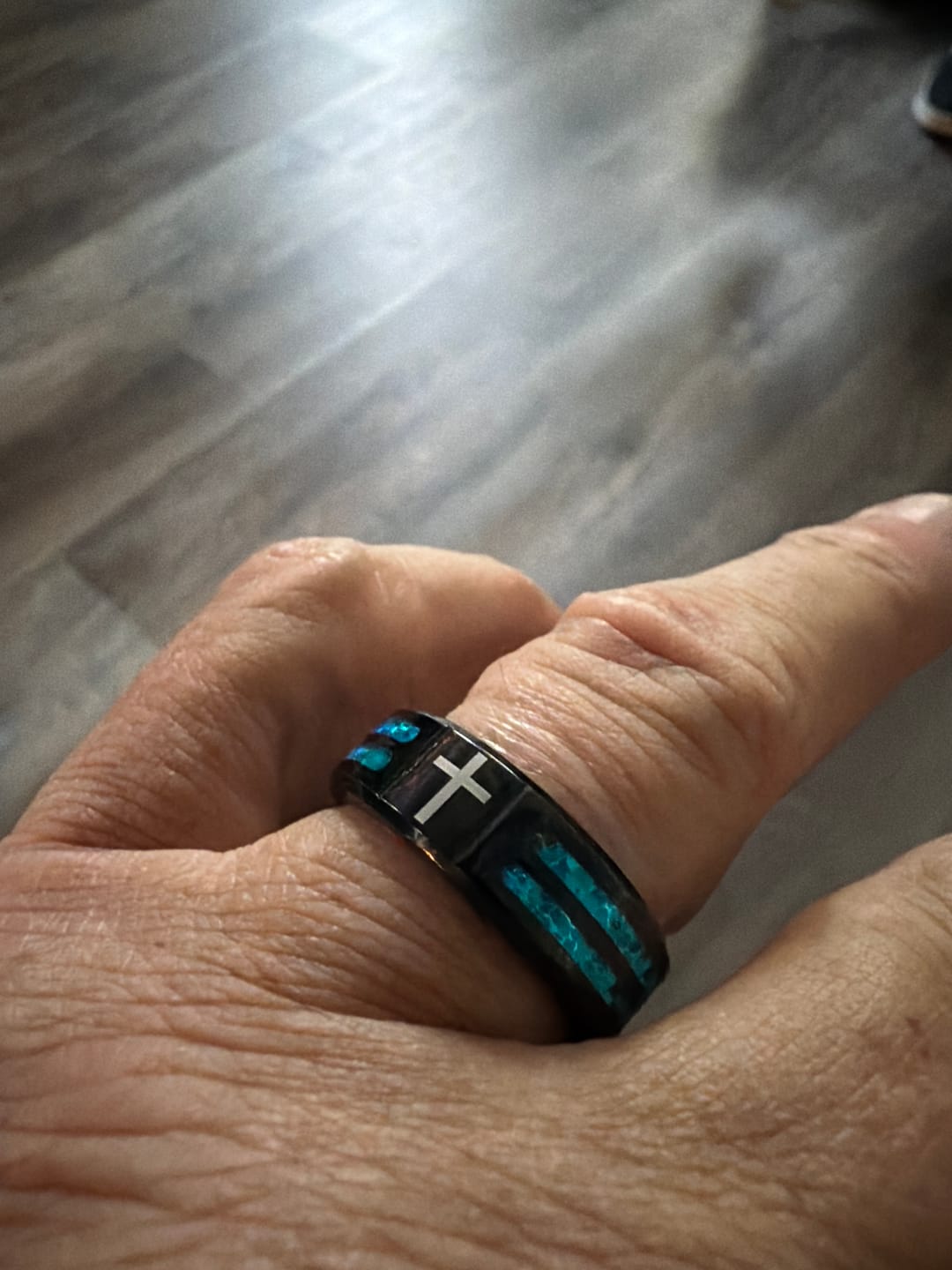 Customer photo review of Christianartworkshop Modern Titanium Steel Cross Ring with Laser Blue Inlay: Serenity in Christ's Blue Light