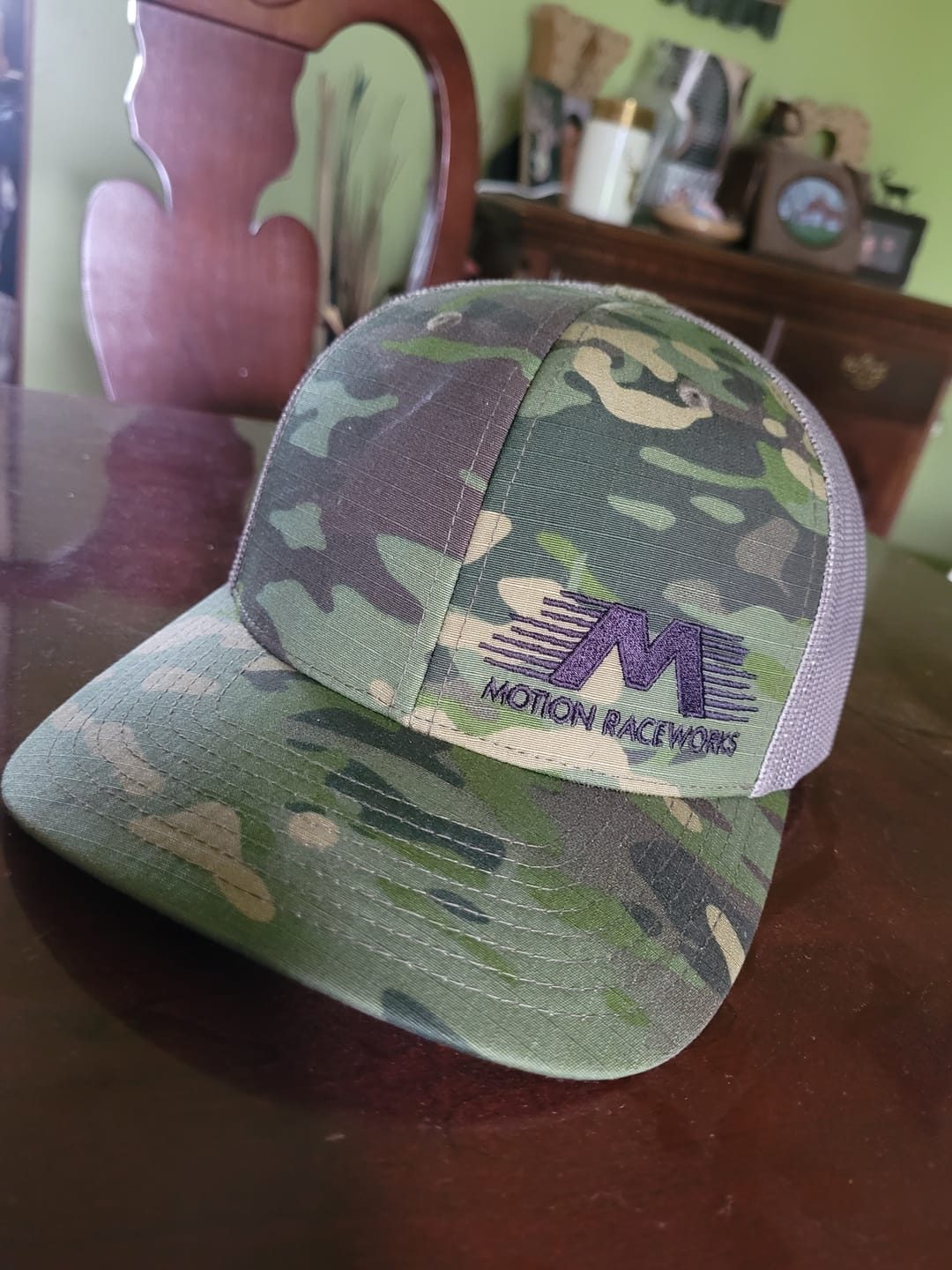 Customer photo review of Multi Camo/Gray & Black Motion Snapback Hat