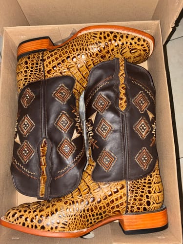 Customer's new Honey Caiman Neck Leather Boots with dark brown shafts and detailed stitching, shown in the box.