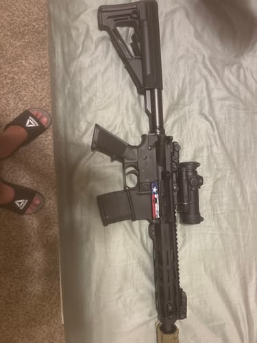 Customer's AR-15 rifle with the Hoffman Tactical Super Safety installed, shown with an optic and adjustable stock.