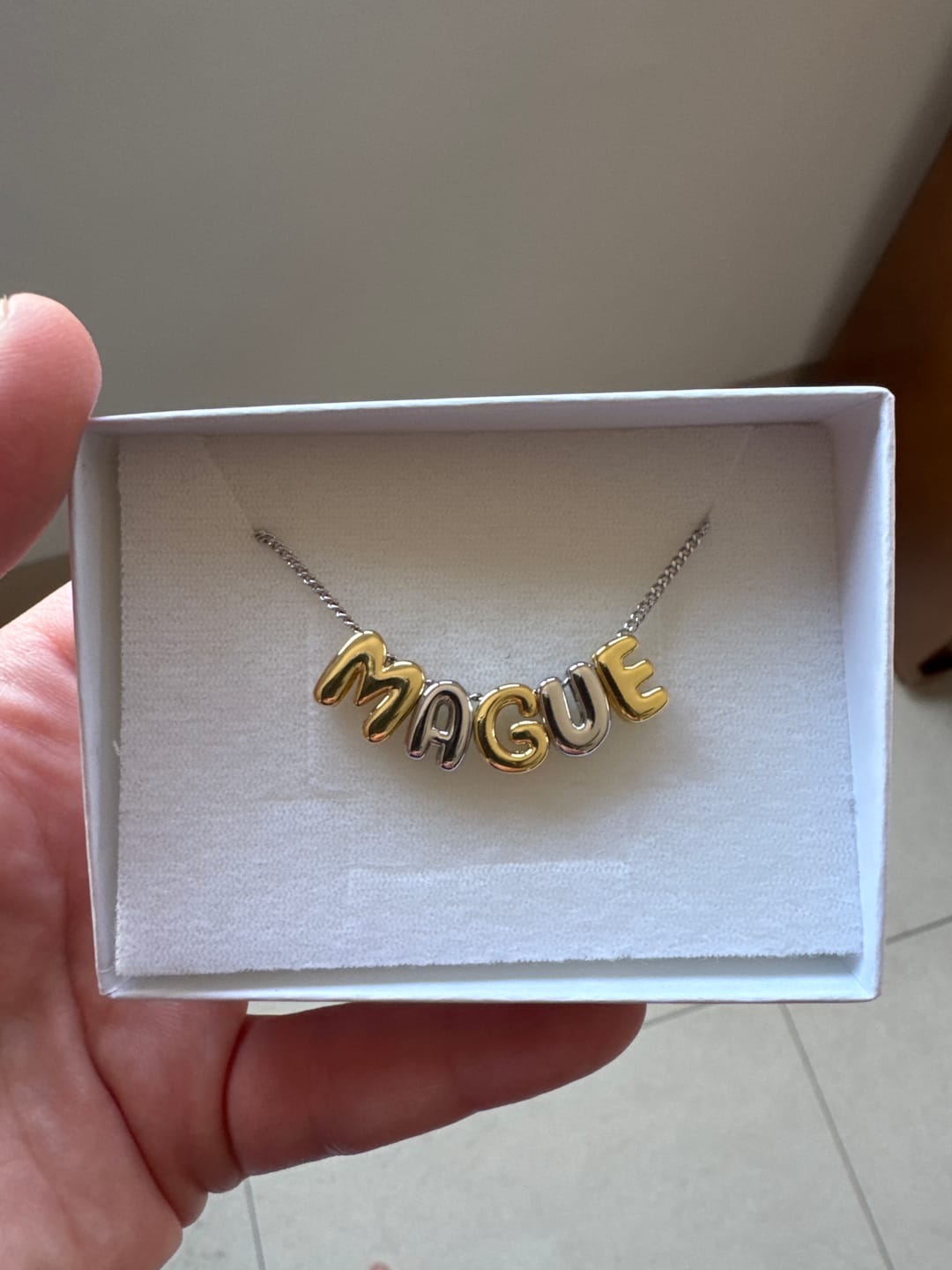 Customer photo review of Personaliza Tu Collar Con Inicial Mini Bubble Plateado