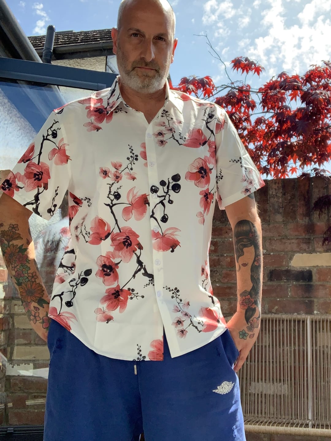 Customer photo review of Men's Casual Pink Floral Print Summer Button Up Flower Short Sleeve Cherry Blossom Shirt
