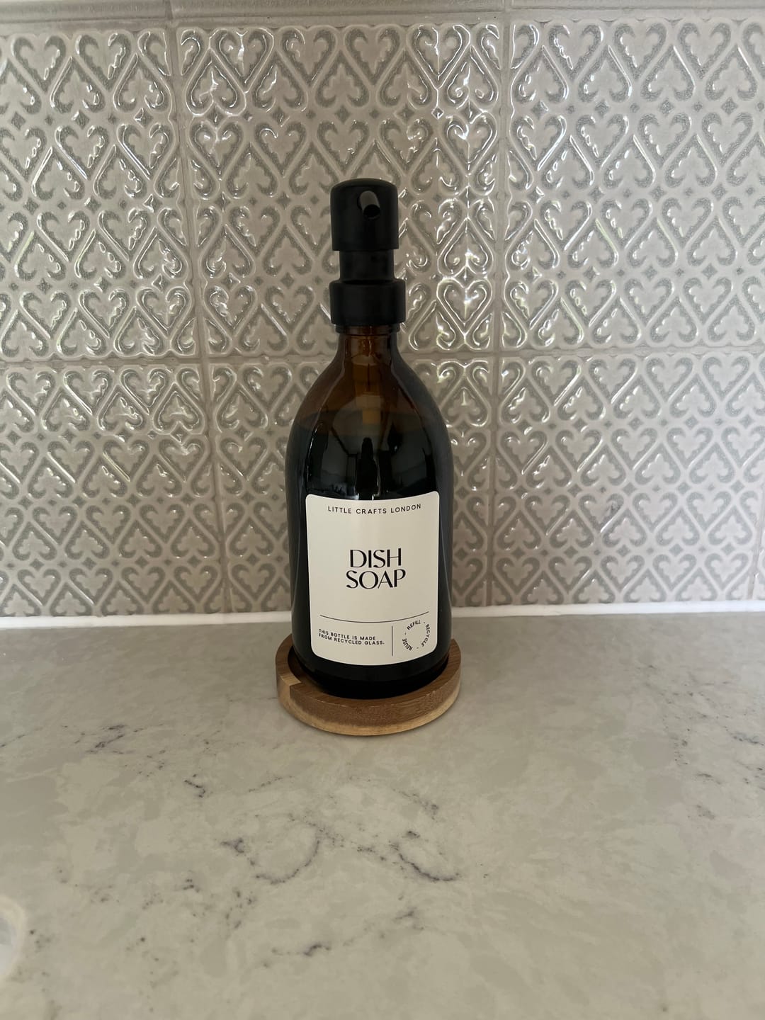 Customer photo review of 500ml Amber Glass Bottle with Metal Pump White Label