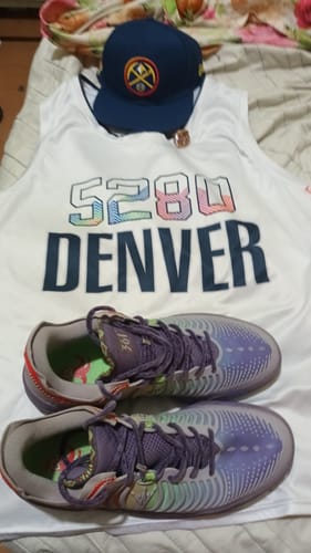 Customer's Joker 2 GT "Joker" shoes displayed with a Denver Nuggets jersey and cap.