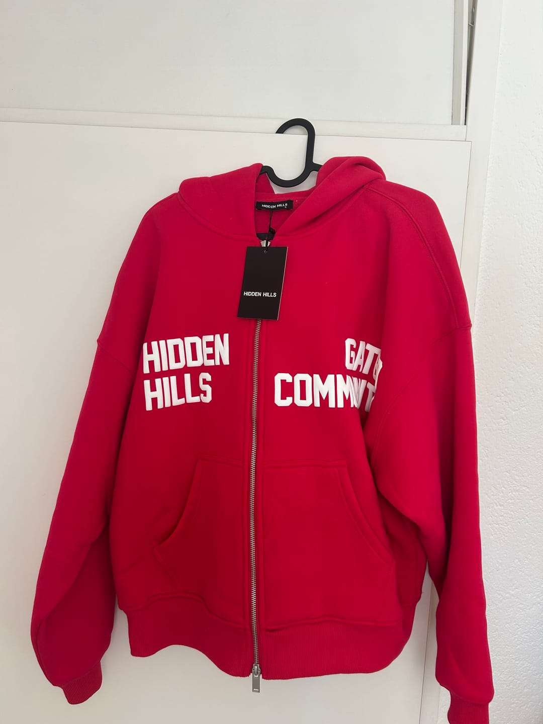 Customer photo review of the GATED COMMUNITY ZIP HOODIE in RASPBERRY RED