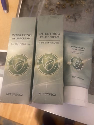 Customer's photo of the wrong product received: two boxes and a tube of Intertrigo Relief Cream.