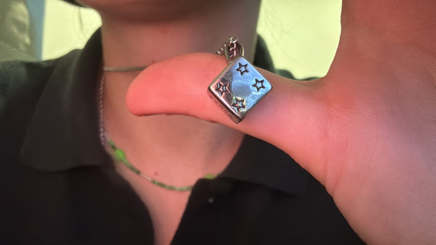 Customer photo review of Dice Pendant